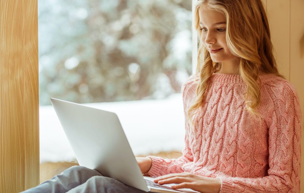 Teenage girl with gadget